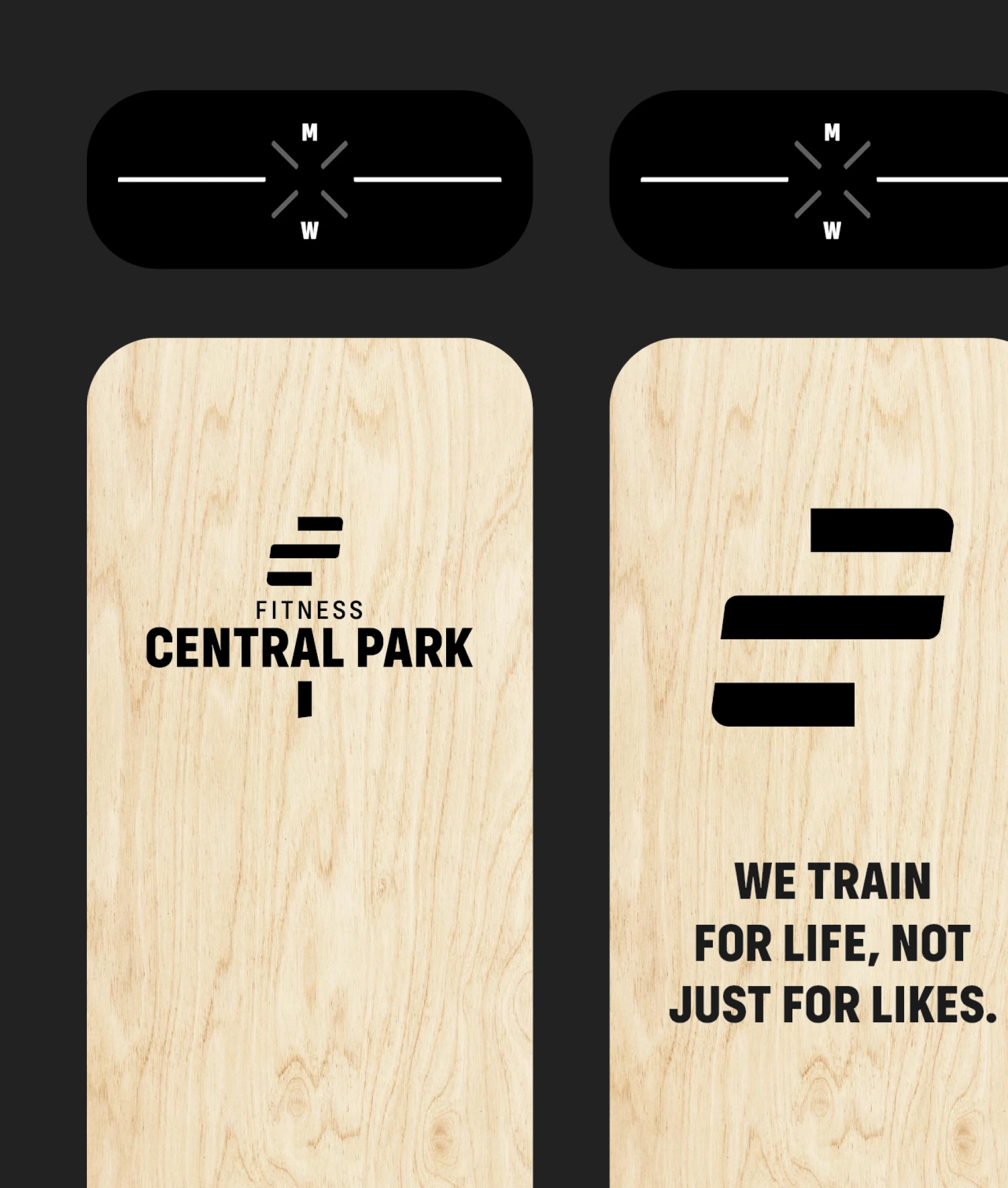 Fitness Central Park gym brand panels — light wood walls with the Fitness Central Park wordmark and the slogan WE TRAIN FOR LIFE, NOT JUST FOR LIKES above black M/W signage