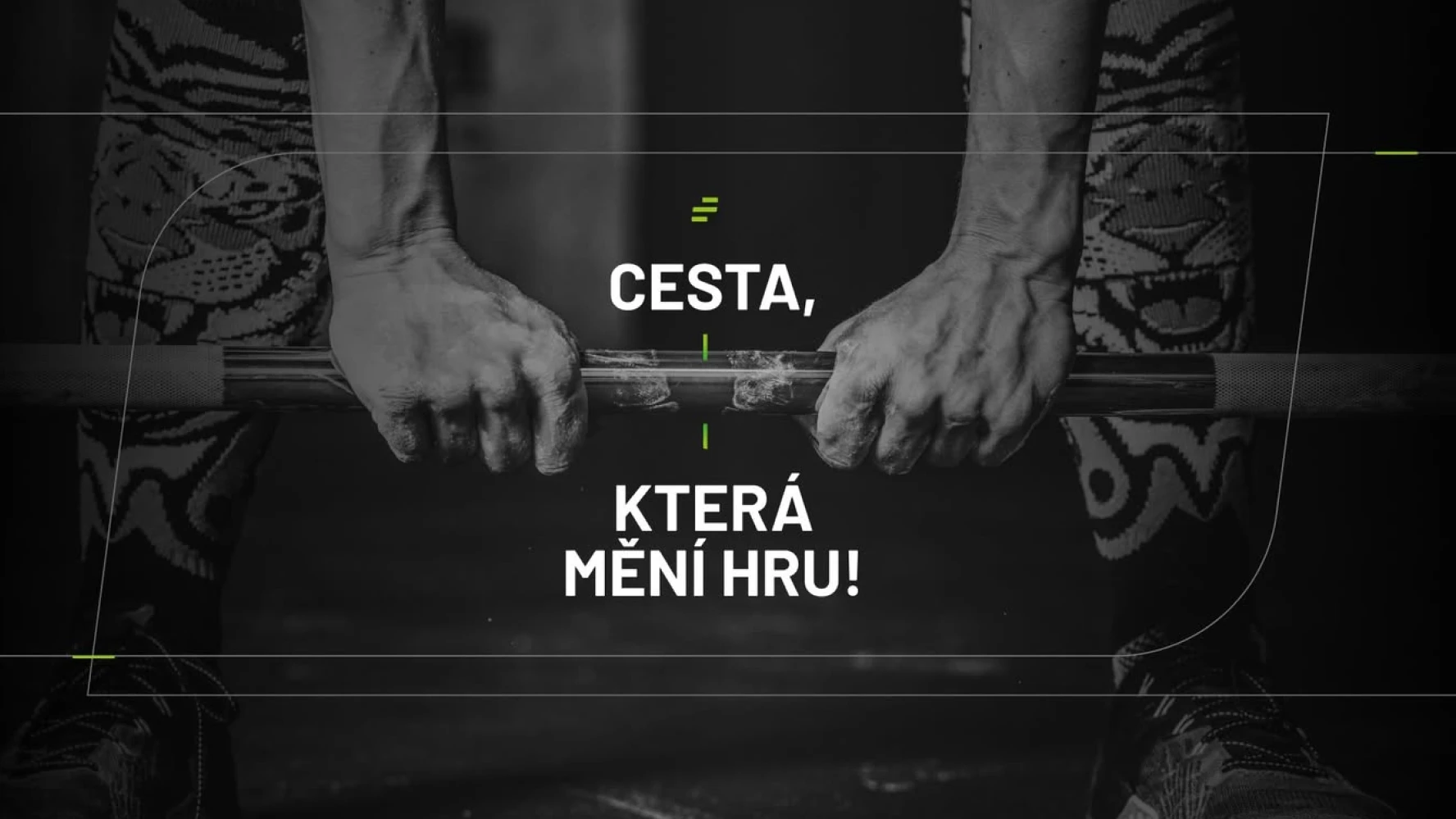 Fitness Central Park CESTA, KTERÁ MĚNÍ HRU campaign slide — bold white type over a black-and-white close-up of chalked hands gripping a barbell