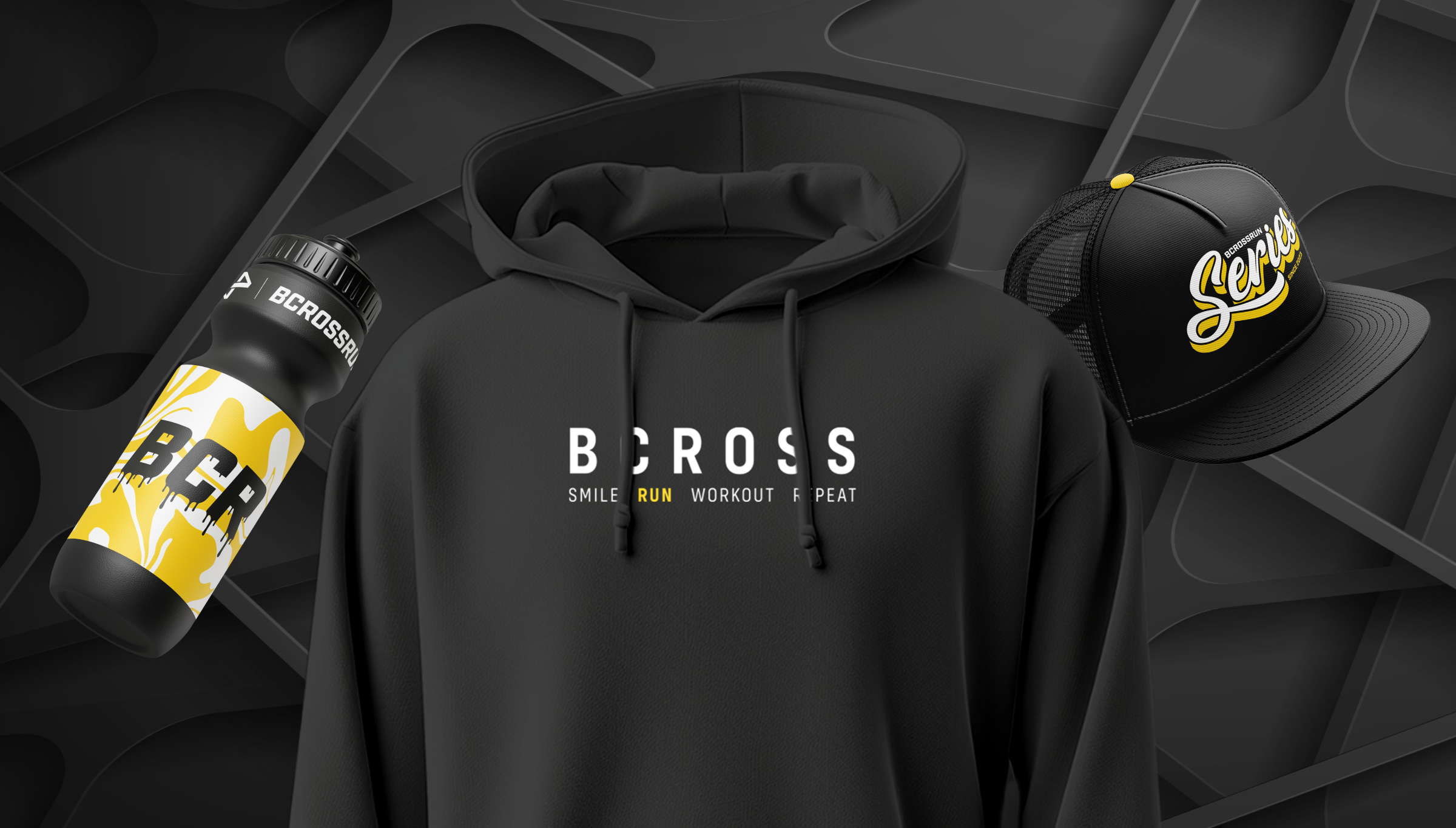 Bcross Run hero merch shot — black hoodie with BCROSS SMILE RUN WORKOUT REPEAT print flanked by BCR yellow drip water bottle and black Series trucker cap on a sculpted black backdrop